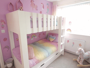 bunk with drawers with a ladder