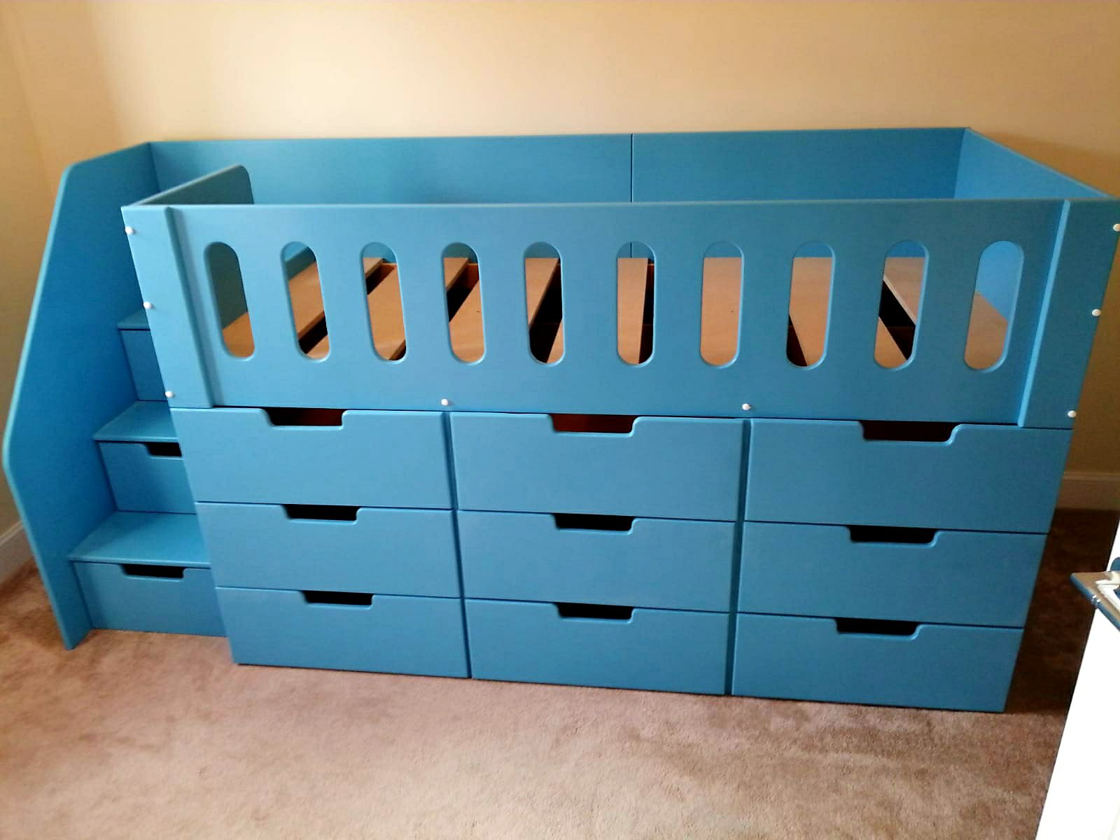 Storage Mid High Sleeper with drawers. Drawers in the stairs bed. In blue with stairs