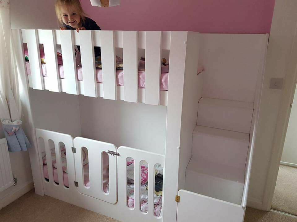 Standard cot bunk bed. cot rail. stair case. stairs. child happy.