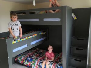 jenga triple bunk. sleep 3. drawers in the stairs. stair case.