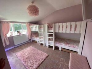 straight quad sleeper sleeping for children in one room. large families.